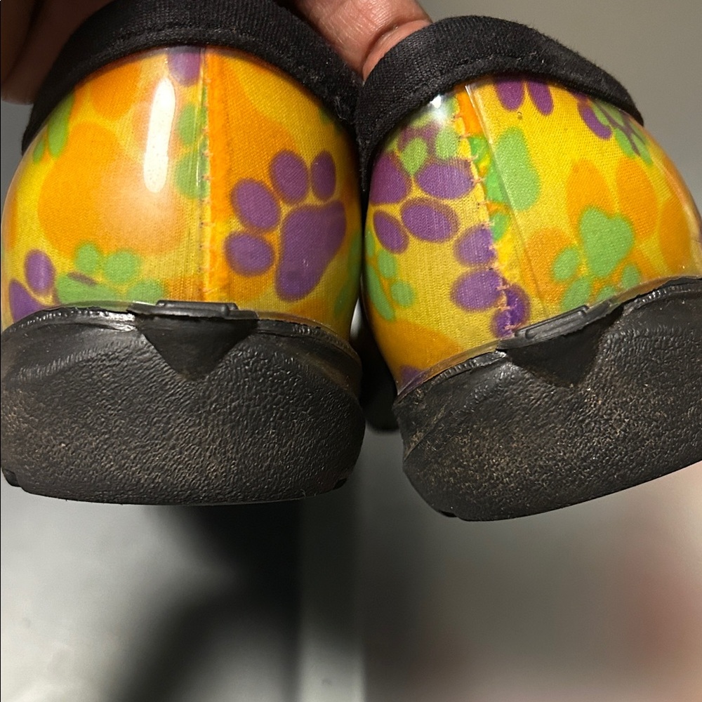 Sloggers Vibrant Yellow Clogs with Purple and Green Paw Prints - Picture 6 of 10